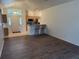 Living room with kitchen island and hardwood flooring at 10913 Sw 69Th Cir, Ocala, FL 34476