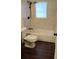 Updated bathroom with dark tile floor, bathtub, and shower at 1570 Se 27Th St # H, Ocala, FL 34471