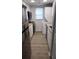Modern kitchen with stainless steel appliances and light cabinets at 1570 Se 27Th St # H, Ocala, FL 34471
