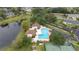 Community pool, tennis courts, and pond at 2505 Se 18Th Cir, Ocala, FL 34471