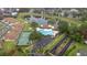 Community pool, tennis courts, and pond view at 2505 Se 18Th Cir, Ocala, FL 34471