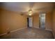 Spacious bedroom with ceiling fan and plush carpeting at 2505 Se 18Th Cir, Ocala, FL 34471