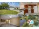 Cute two-bedroom villa with a two-car garage and a well-maintained lawn at 2505 Se 18Th Cir, Ocala, FL 34471