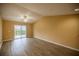 Living room with sliding glass doors to the patio at 2505 Se 18Th Cir, Ocala, FL 34471