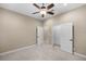 Spacious bedroom with ceiling fan and double closets at 3907 Se 10Th Ave, Ocala, FL 34480