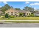 Single-story home with stone accents and landscaped yard at 3907 Se 10Th Ave, Ocala, FL 34480