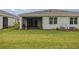 Screened patio and grassy backyard at 5237 Nw 48Th Pl, Ocala, FL 34482