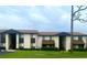 Two-story condo building with well-maintained landscaping and ample parking at 548 Fairways Dr # B, Ocala, FL 34472