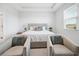Bedroom with a king-size bed and two armchairs at 6243 Sw 89Th Street Rd, Ocala, FL 34476