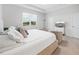 King-size bed in a spacious main bedroom with natural light at 6243 Sw 89Th Street Rd, Ocala, FL 34476