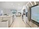 Open concept kitchen with stainless steel appliances at 6243 Sw 89Th Street Rd, Ocala, FL 34476