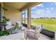 Relaxing screened porch overlooking a lush green backyard at 6243 Sw 89Th Street Rd, Ocala, FL 34476