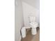 Guest bathroom with toilet and small trash can at 6243 Sw 89Th Street Rd, Ocala, FL 34476