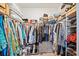 Large walk-in closet with ample hanging and shelving space at 6243 Sw 89Th Street Rd, Ocala, FL 34476