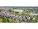 Aerial view of a residential area near a golf course and lake at 6622 Sw 97Th Terrace Rd, Ocala, FL 34481