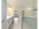 Elegant bathroom with double vanity, large shower, and modern fixtures at 6622 Sw 97Th Terrace Rd, Ocala, FL 34481