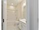 Clean bathroom with bathtub, toilet and vanity with white cabinets at 6622 Sw 97Th Terrace Rd, Ocala, FL 34481