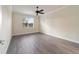 Spacious bedroom with ceiling fan and grey flooring at 6622 Sw 97Th Terrace Rd, Ocala, FL 34481