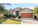 One story house with an attached garage, and manicured lawn at 6622 Sw 97Th Terrace Rd, Ocala, FL 34481