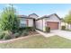 One-story house with attached garage and lush landscaping at 6622 Sw 97Th Terrace Rd, Ocala, FL 34481