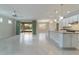 Open kitchen with island and access to the backyard at 6622 Sw 97Th Terrace Rd, Ocala, FL 34481