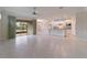 Bright living room with tile floors and sliding glass doors to patio at 6622 Sw 97Th Terrace Rd, Ocala, FL 34481