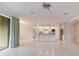 Open living area with tile floors and kitchen view at 6622 Sw 97Th Terrace Rd, Ocala, FL 34481