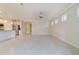 Living room with tile floors and access to kitchen at 6622 Sw 97Th Terrace Rd, Ocala, FL 34481