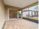 Relaxing screened patio with access to backyard at 6622 Sw 97Th Terrace Rd, Ocala, FL 34481