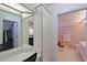 Vanity area with adjacent bathroom and closet at 8225 Sw 108Th Loop, Ocala, FL 34481