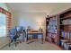 Home office with ample shelving and a computer workstation at 8225 Sw 108Th Loop, Ocala, FL 34481