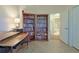 Spacious home office with bookshelves and access to bathroom at 8225 Sw 108Th Loop, Ocala, FL 34481