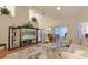 Open living room with hardwood floors and comfy seating at 8225 Sw 108Th Loop, Ocala, FL 34481