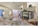 Spacious living room with hardwood floors and large TV at 8225 Sw 108Th Loop, Ocala, FL 34481