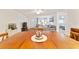 Dining area with wood table and chairs, centered in the room at 8851 Sw 92Nd Pl # D, Ocala, FL 34481