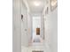 Clean hallway with tile floors and access to bedrooms and bathroom at 9646 Sw 92 Place Rd, Ocala, FL 34481