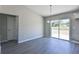 Spacious dining area with sliding glass door to backyard at 115 Guava Place Dr, Ocklawaha, FL 32179