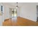 Dining room with wood floors and sliding glass doors at 15509 Sw 34Th Court Rd, Ocala, FL 34473