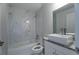 Bathroom features white vanity, granite countertop and soaking tub at 16919 Sw 27Th Ave, Ocala, FL 34473