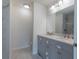 Bathroom boasts double vanity, granite countertop and marble tile at 16919 Sw 27Th Ave, Ocala, FL 34473