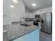 Modern kitchen with stainless steel appliances and granite countertops at 16919 Sw 27Th Ave, Ocala, FL 34473