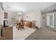 Open concept dining room with a view of the kitchen and bathroom, including a table and chairs at 17006 Sw 39Th Cir, Ocala, FL 34473