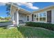 Front porch featuring a bench and holiday decor, welcoming guests at 17006 Sw 39Th Cir, Ocala, FL 34473