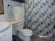 Clean bathroom with shower/tub combo and updated vanity at 17935 Se 10Th Pl, Silver Springs, FL 34488