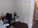 Bright home office features built-in closet and dark wood floors at 17935 Se 10Th Pl, Silver Springs, FL 34488