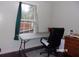 Home office with desk and chair, and window at 17935 Se 10Th Pl, Silver Springs, FL 34488