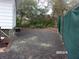 Side yard with gravel ground cover and privacy fence at 17935 Se 10Th Pl, Silver Springs, FL 34488
