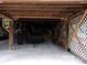 Under house storage area with a trailer and other items at 17935 Se 10Th Pl, Silver Springs, FL 34488