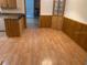 Dining area with wood laminate flooring and wood cabinets at 1855 Ne 23Rd St, Ocala, FL 34470