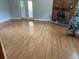 Living room with wood flooring and fireplace at 1855 Ne 23Rd St, Ocala, FL 34470